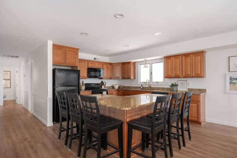Fully-Equipped Kitchen with Bar Seating