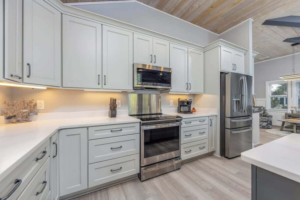 Updated Kitchen with Stainless Steel Appliances, Quartz Countertops, and Shaker Cabinets
