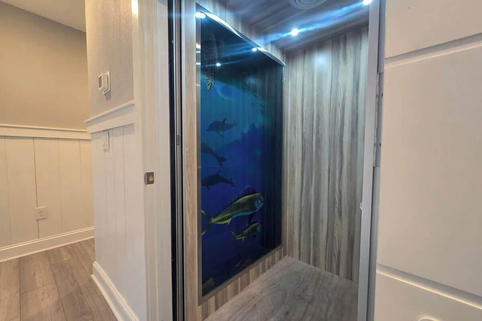 Elevator with Custom Mural of Local Landscapes and Wildlife!