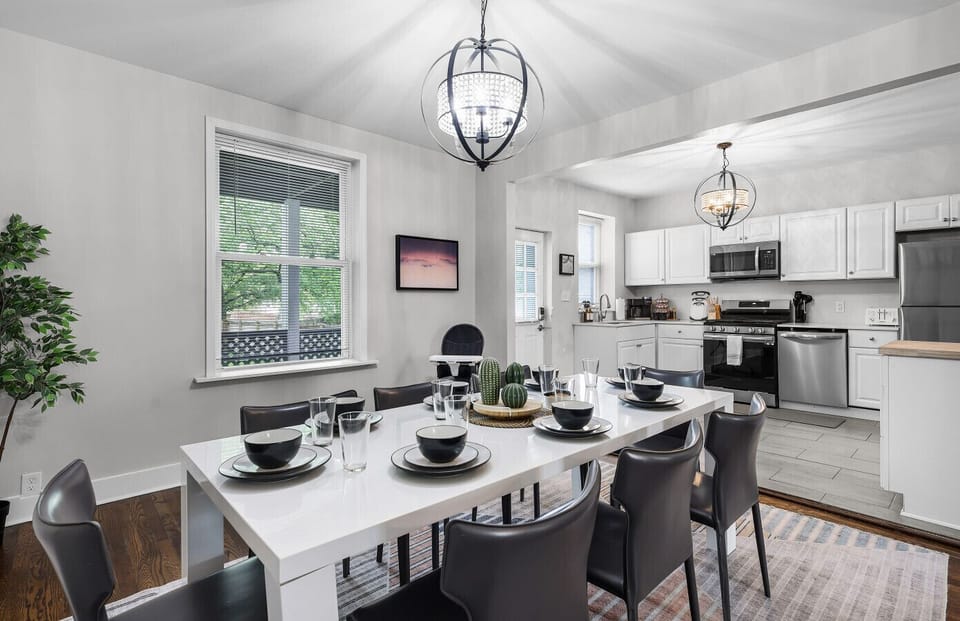 Our dining area comfortably accommodates eight guests and comes with a complete setup, including utensils and a thoughtful selection of children's dinnerware.