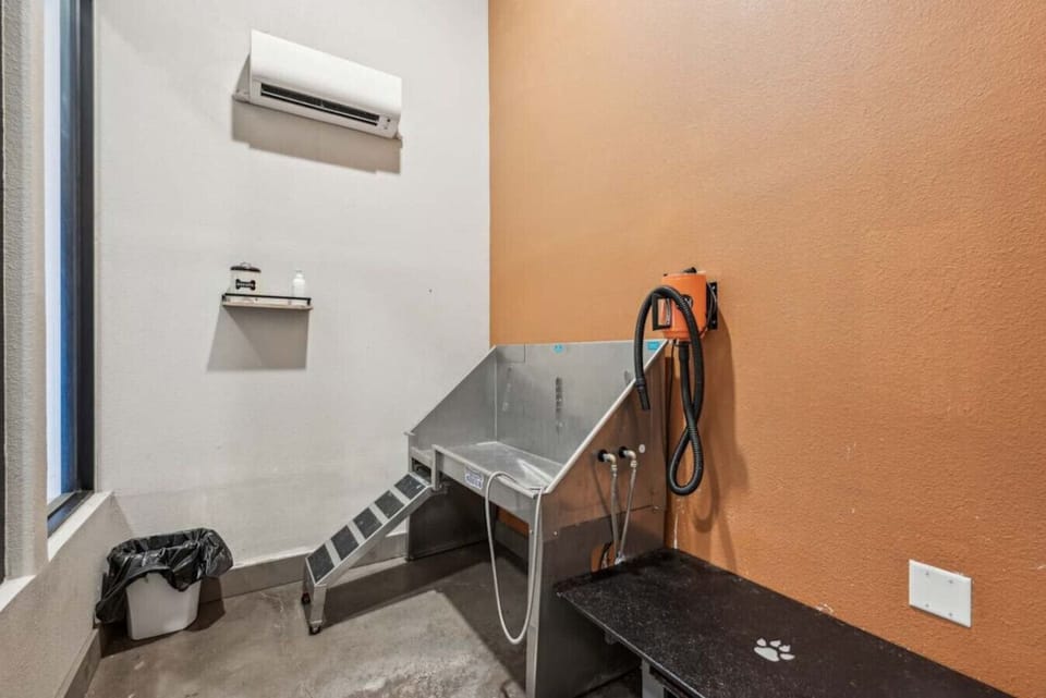 - Dedicated pet wash station with elevated grooming tub - Handheld sprayer and drying station for easy cleanup - Convenient onsite pet spa for resident use
