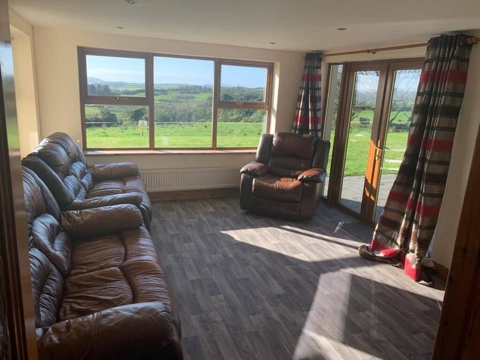 Bright living room with access to patio and garden