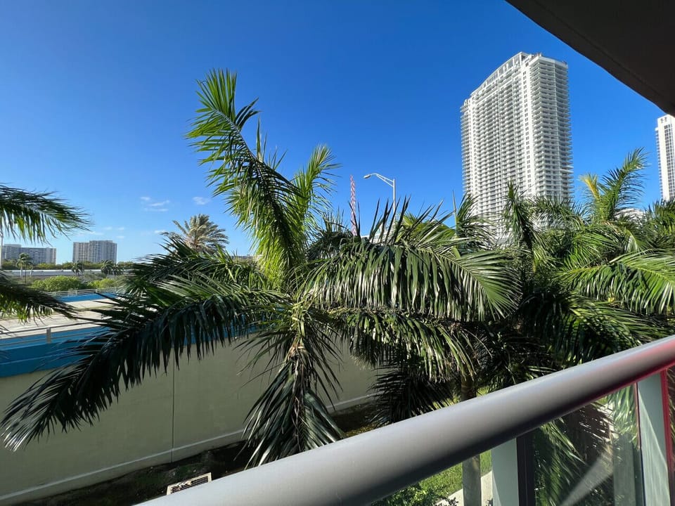 Stylish balcony with outdoor seating — ideal for sipping your morning coffee or unwinding at sunset.