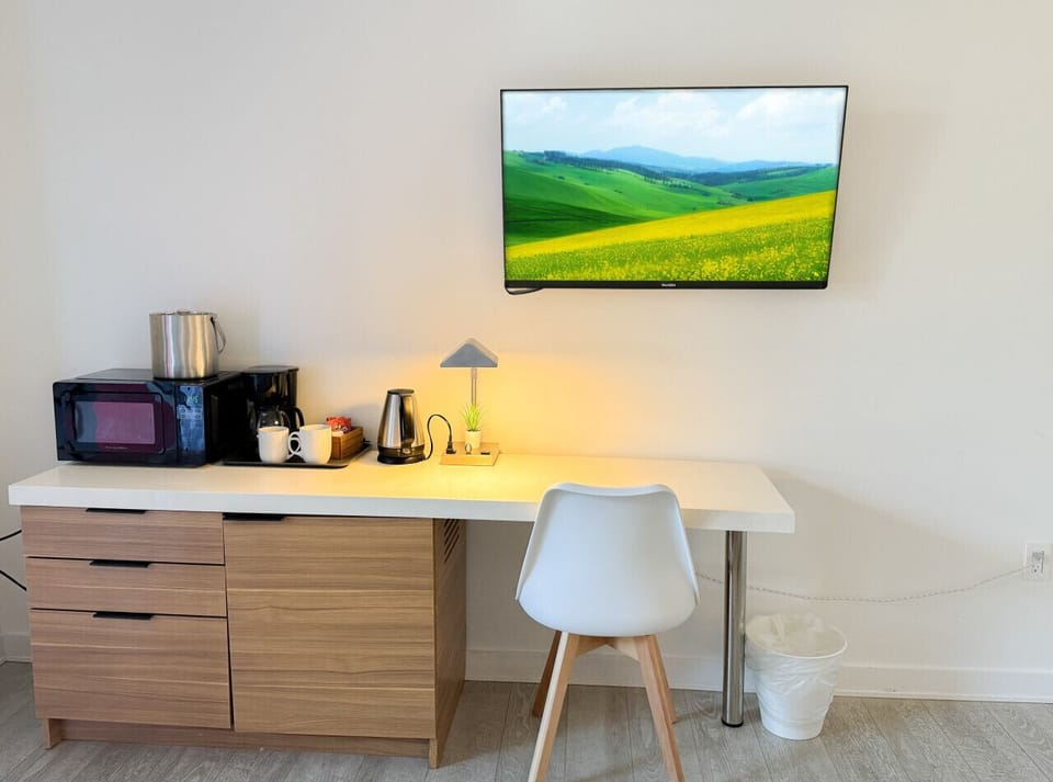 Workspace with amenities and TV