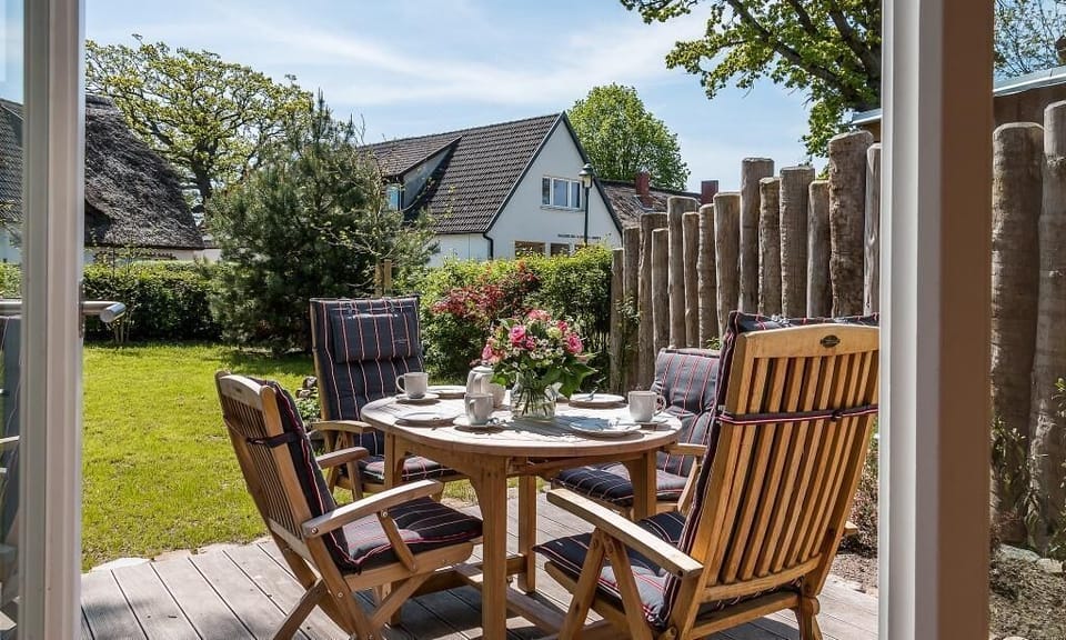 Terrace with table and chairs in the garden