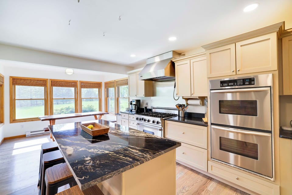 Fully stocked kitchen with a Viking range + a double oven