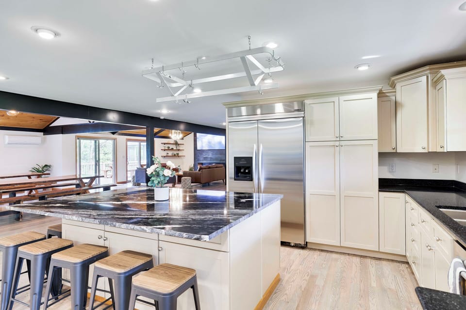 Plus sized refrigerator made for large groups (additional fridge downstairs)