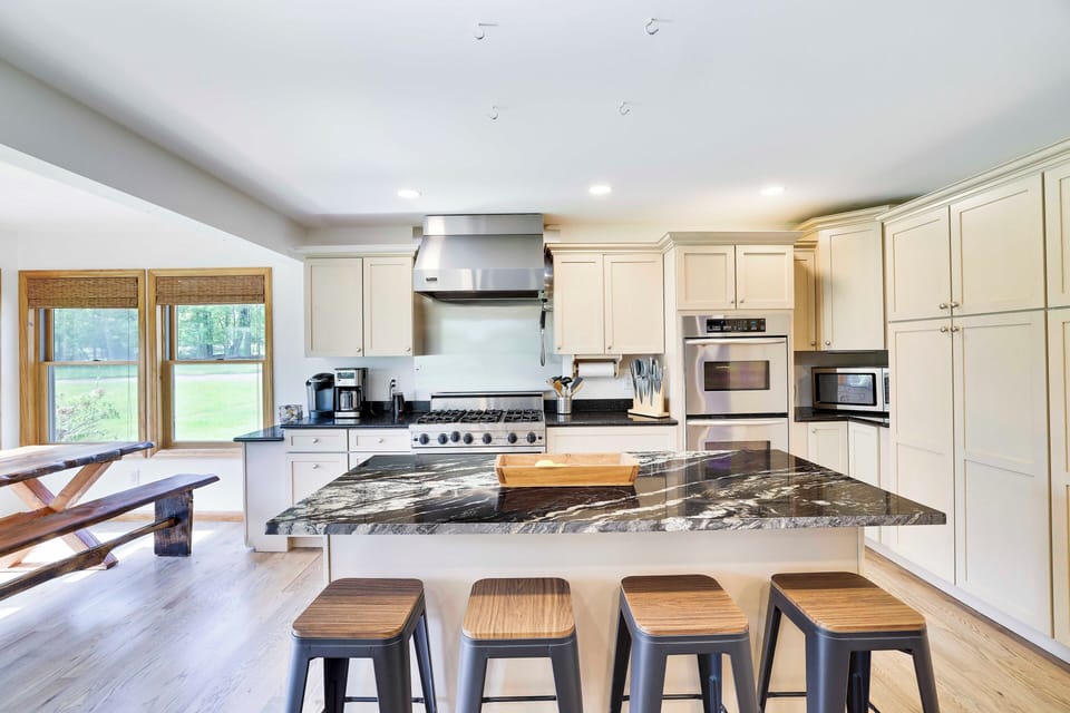 Fully stocked kitchen with a Viking range + a double oven