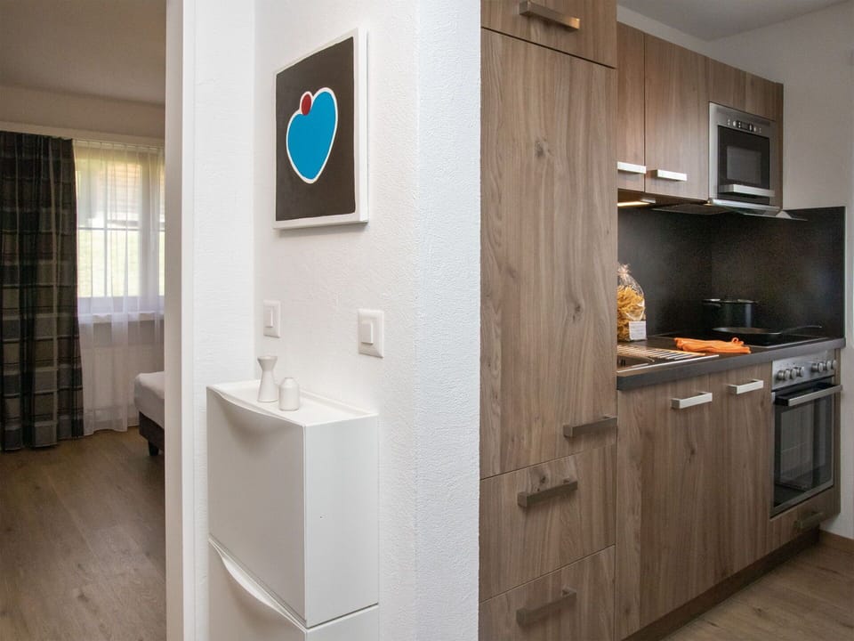 Interior Design, Furniture, Wood, Flooring, Floor, Cabinetry, Countertop, Room, Kitchen, Ceiling