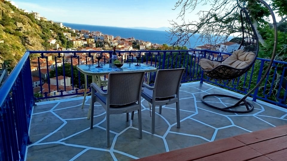 Wine and Dine on top of the world with panoramic Aegean sea views.