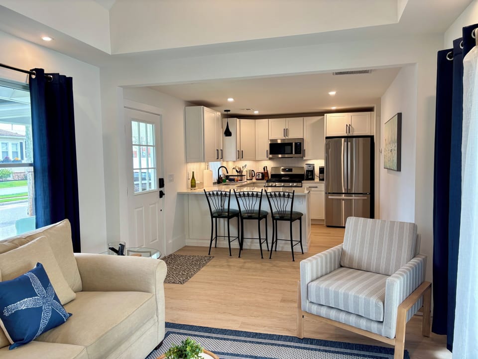 Living room has slider to private backyard. 