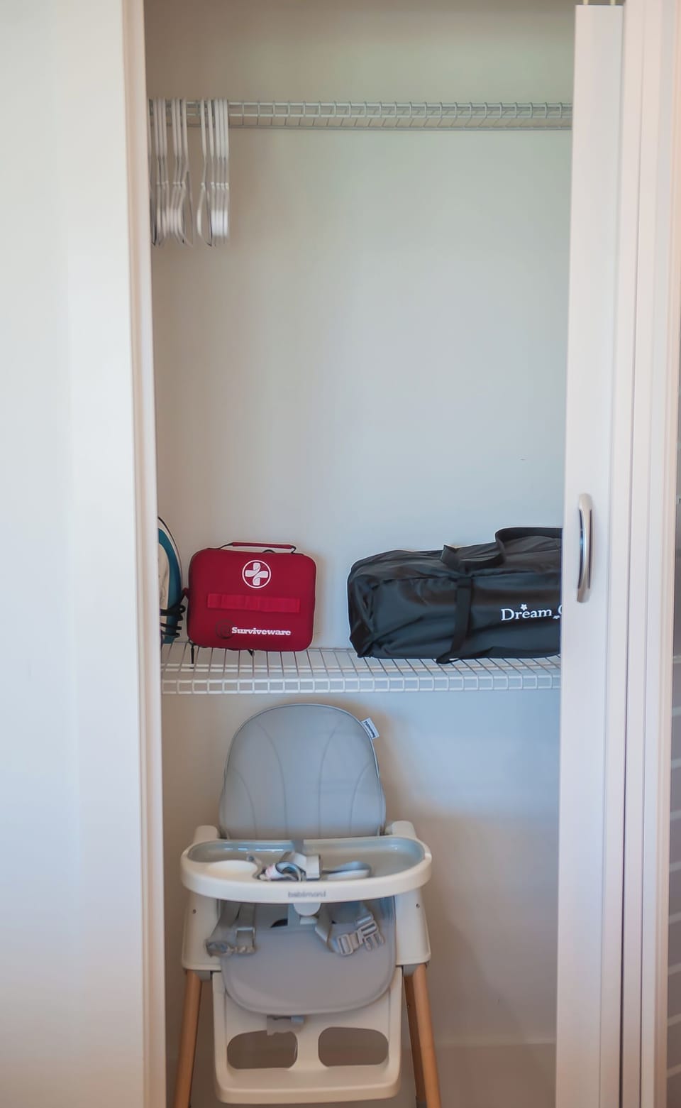 Master closet with first aid kit high chair and play pen