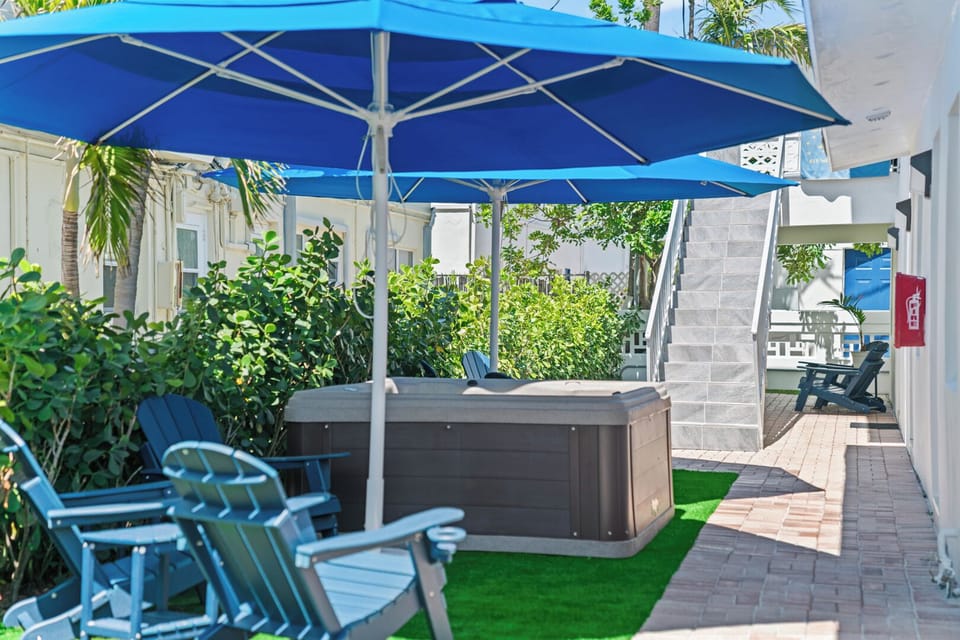 Relax and recharge in the outdoor jacuzzi, just steps from your door