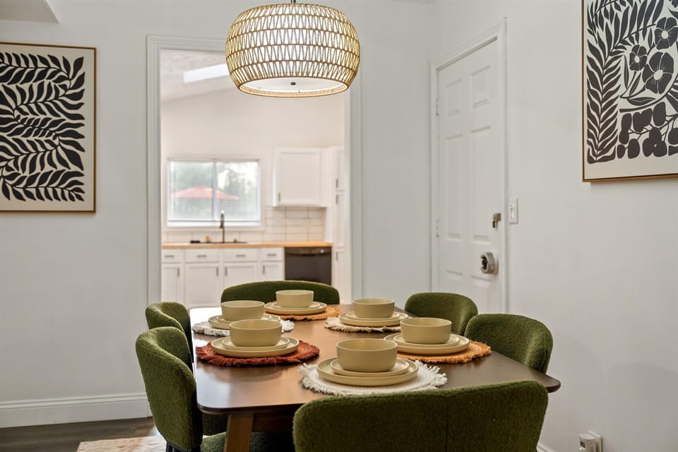 Chandelier and table set up for the dining area
