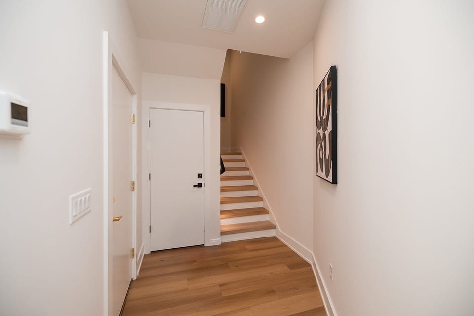 Bright and airy open-concept living spaces feature curated décor, upscale furnishings, and natural light throughout both homes.