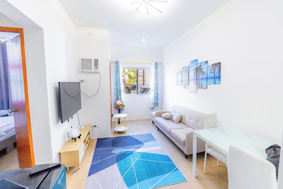 Spacious living room with smart TV and wifi