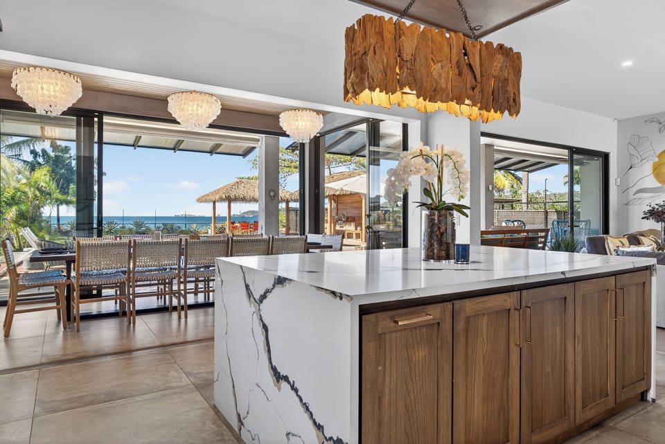 Kitchen is connected to the dining area. 