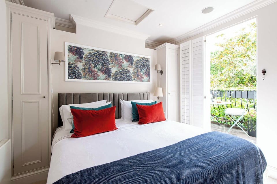 Bedroom 2 opens to a charming balcony.