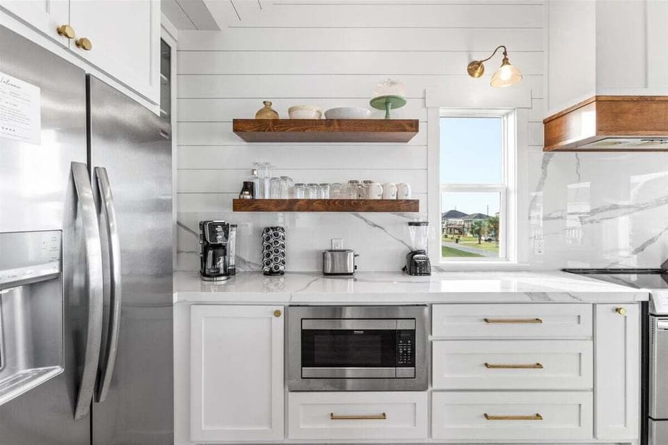 Coffee station and microwave area with open shelving and modern finishes