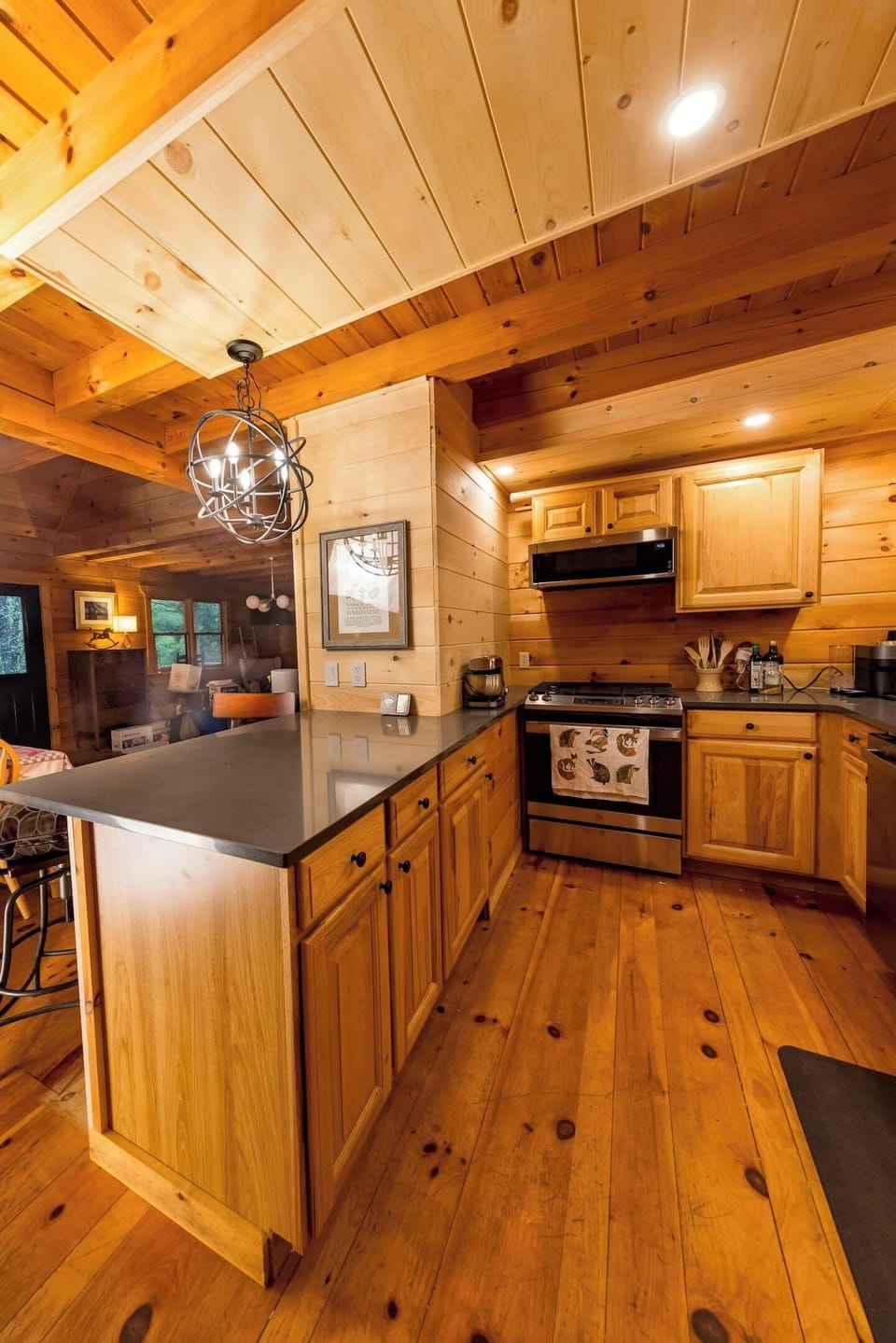Open island to the dining room area. Quartz countertop.