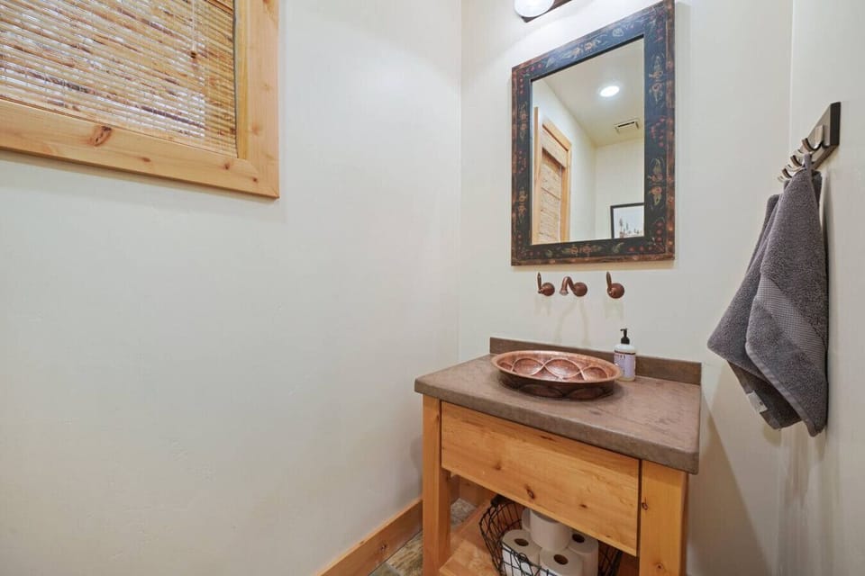 Half bathroom - with toilet, sink and complimentary toiletries.