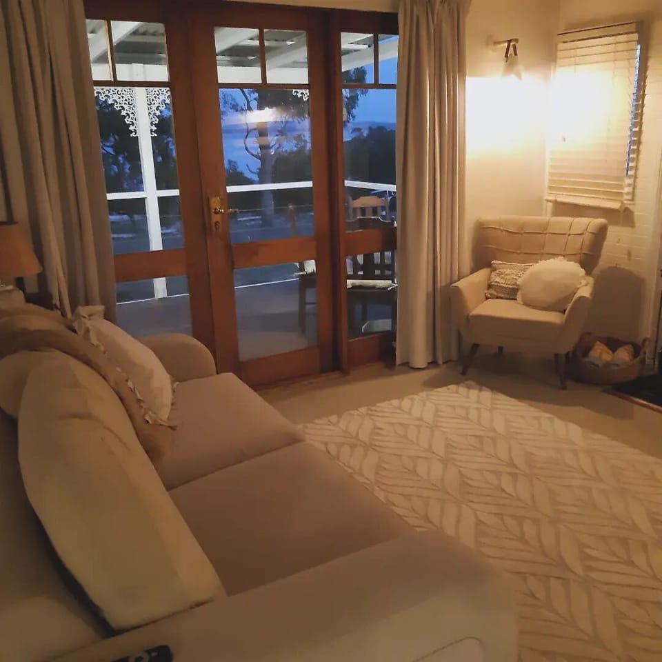 Views to the Tamar River. French doors open onto the front deck.