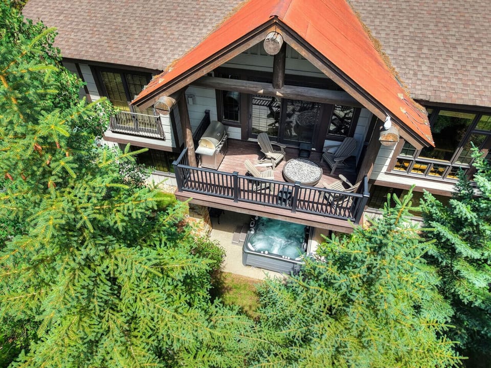 Aerial View of Patio and Lower Deck with Large Hot Tub