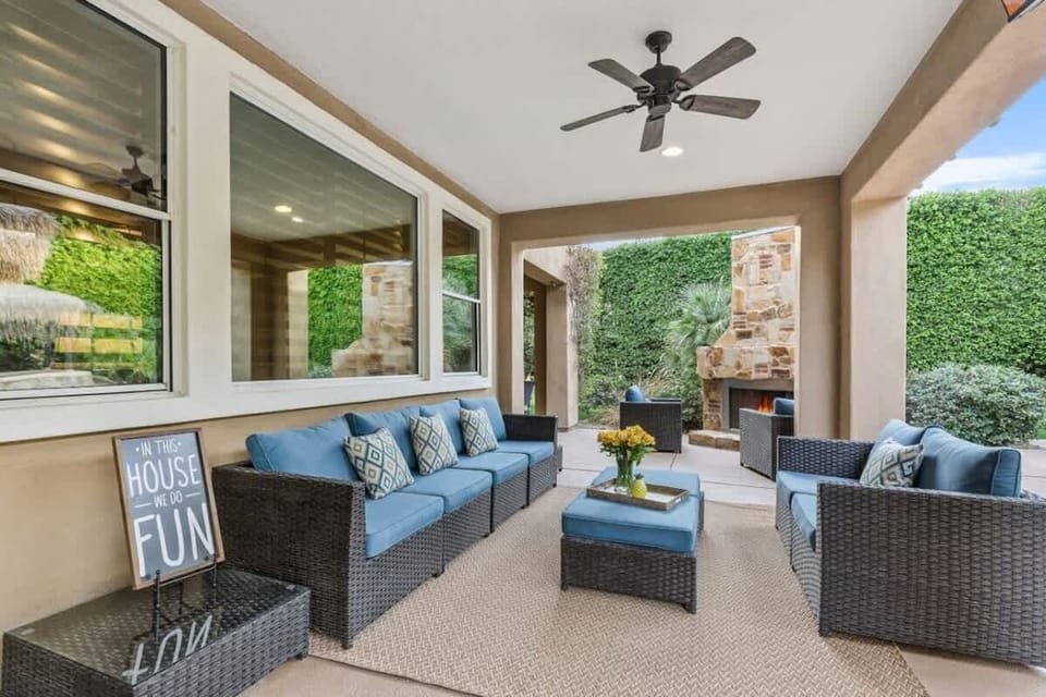 Embrace the charm and comfort of this inviting seating area.