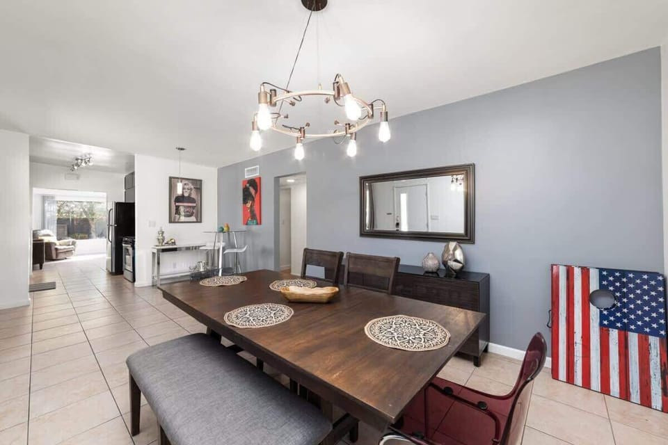 Spacious Dining Area with Dining Table & Chairs