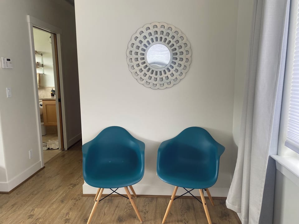 Comfy chairs in double double bedroom