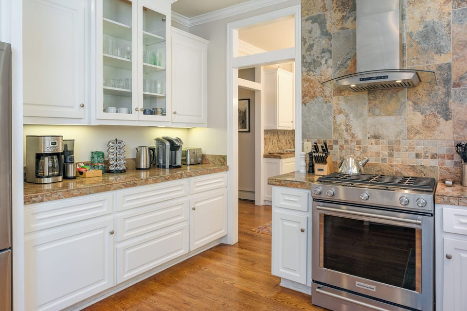 The coffee bar destination: Cuisinart Drip Coffeemaker, Keurig, French Press, Cuisinart coffee grinder, Peet's Organic Coffee, and selection of sweeteners, tea and hot cocoa. Plus, an electric kettle for those that blaze their own non-coffee trail.