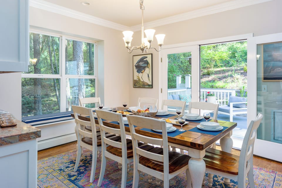 Dining for eight with easy access to the outdoor patio dining and gardens.