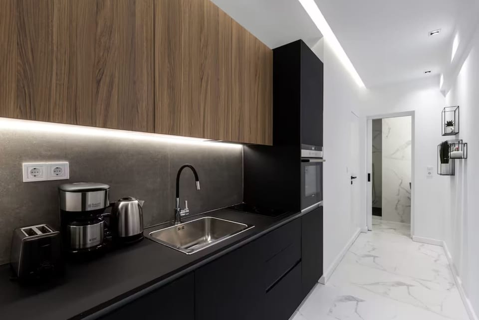 Sleek modern kitchen features premium finishes and everything needed for effortless everyday meal preparation.