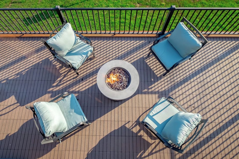 Private deck with comfy seating & a fire table we loved.