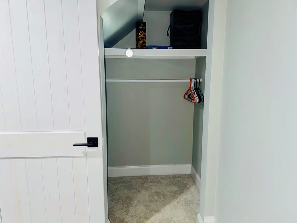 Closet area with storage space. 