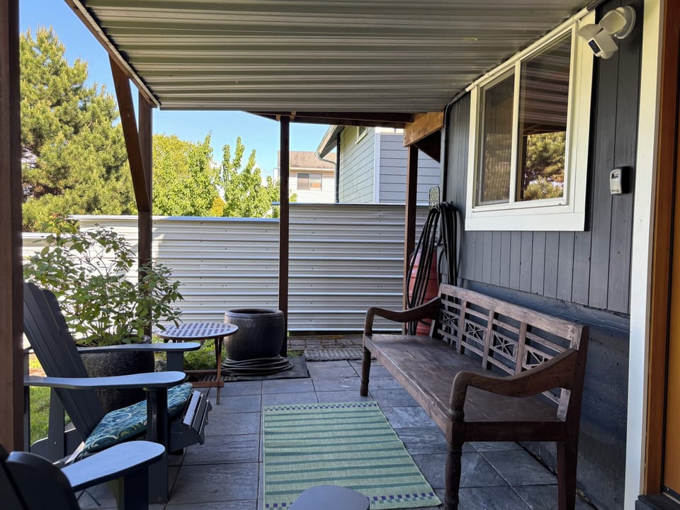 Your private seating area outside your unit, with access to backyard.