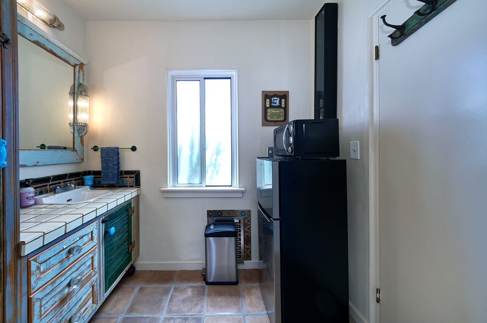 Dressing area with small refrigerator and microwave 