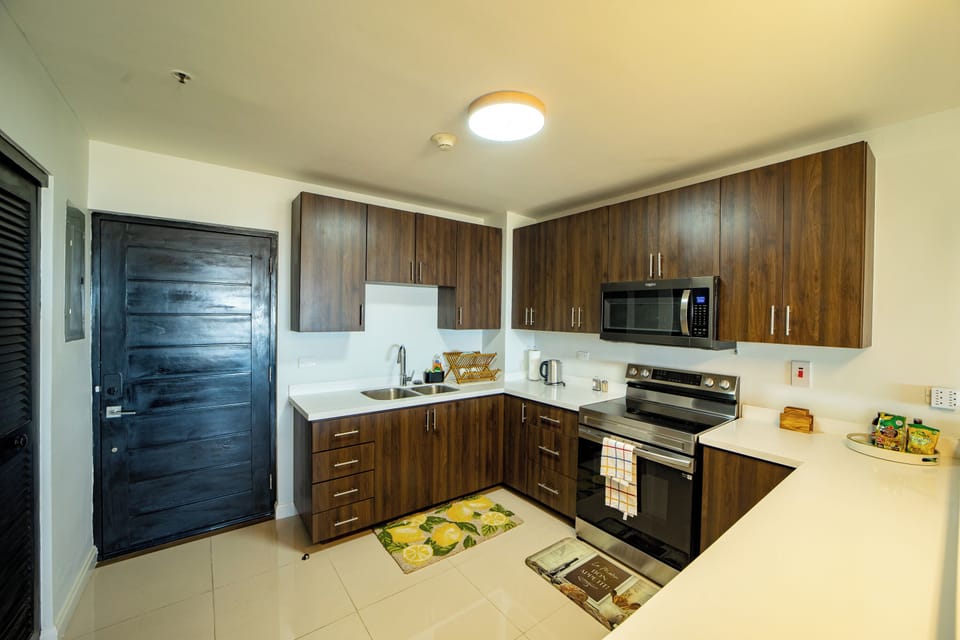 Kitchen Equipped with all utensils and crockery needed