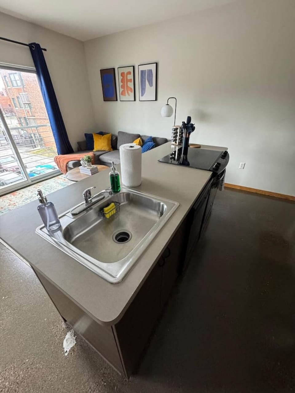 The kitchen’s open layout allows you to move freely as you prepare meals, with everything you need at your fingertips.