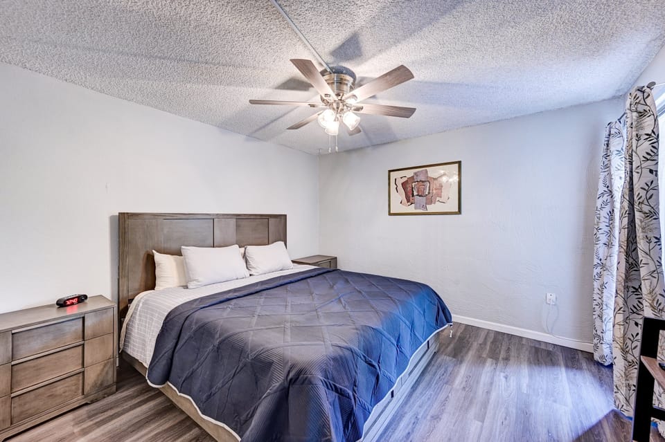 Stretch out and recharge in the king-size bed, complete with soft linens for a good night's sleep.