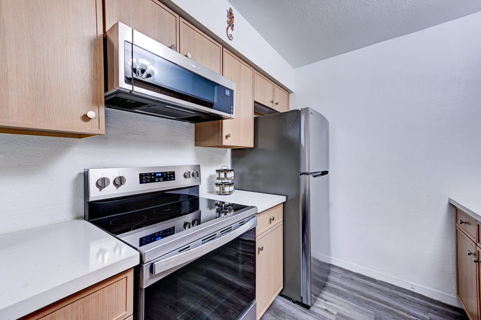 Clean, modern appliances and thoughtful extras make in-condo meals easy and convenient.