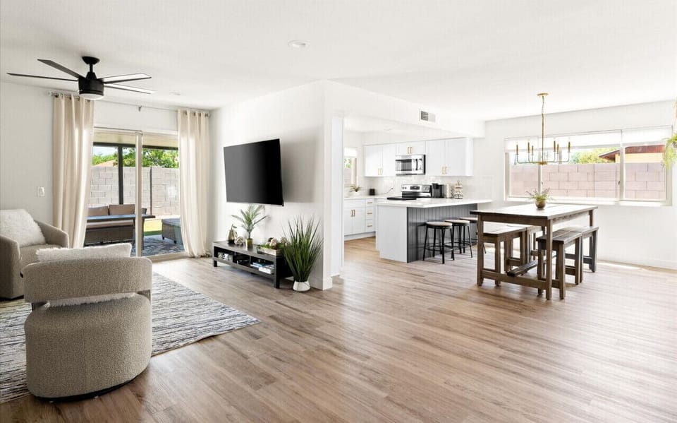 Spacious open-concept living and dining area for social gatherings.
