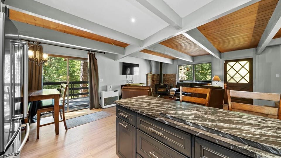 Kitchen opens to living