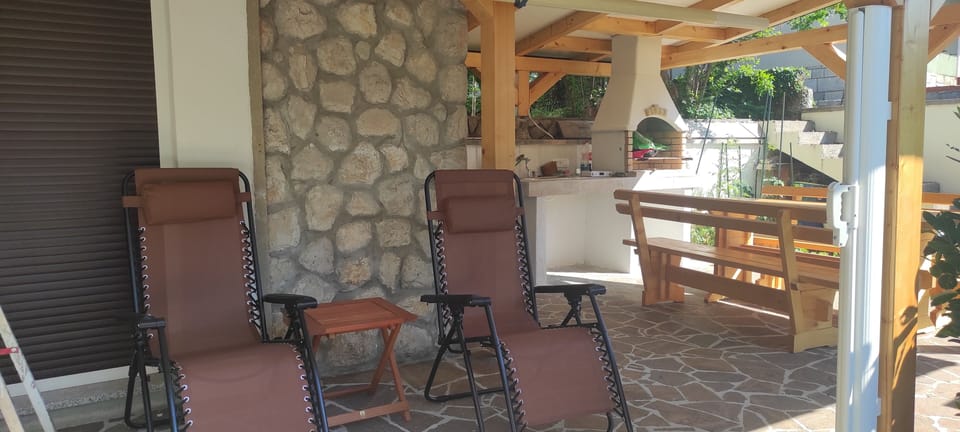 Relaxing under pergola