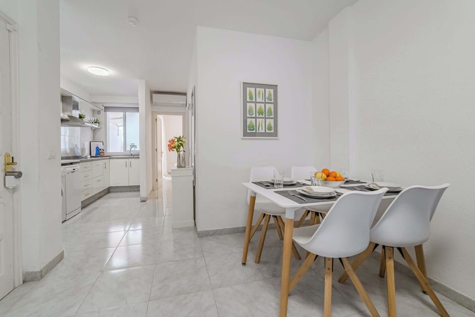 Dining Table Set for four with Plush Seating for a Refined Dining Experience.