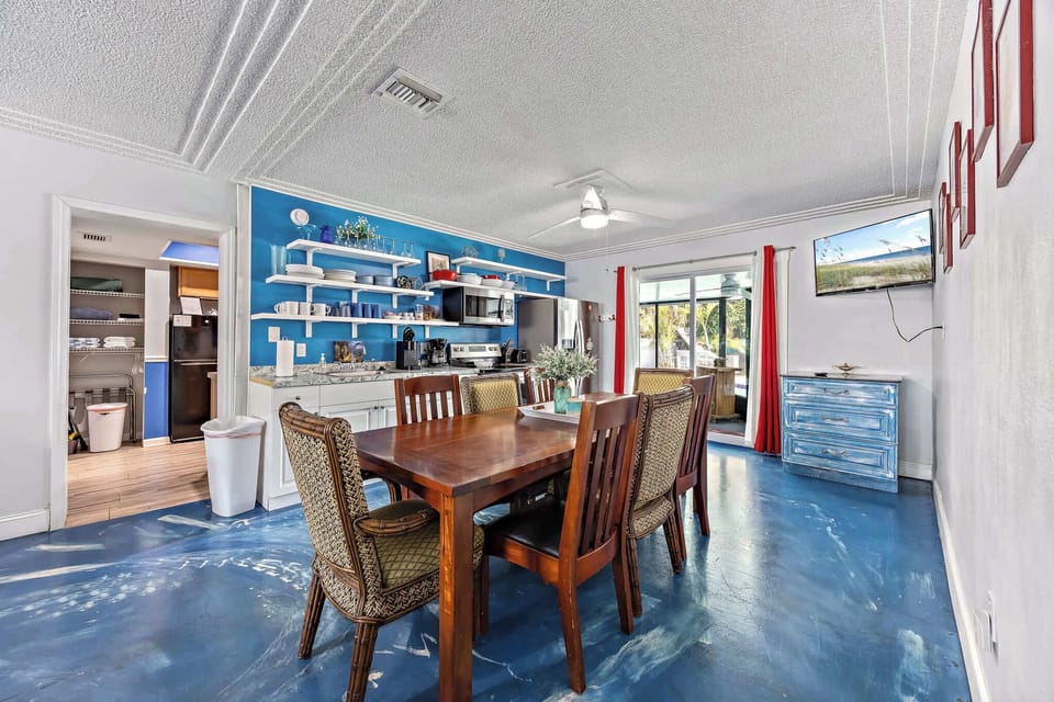Blue floor dining area open kitchen