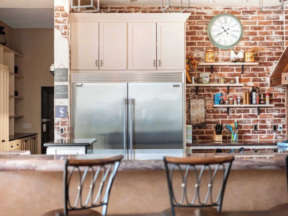 Copper-accented kitchen adding charm to every cooking moment.