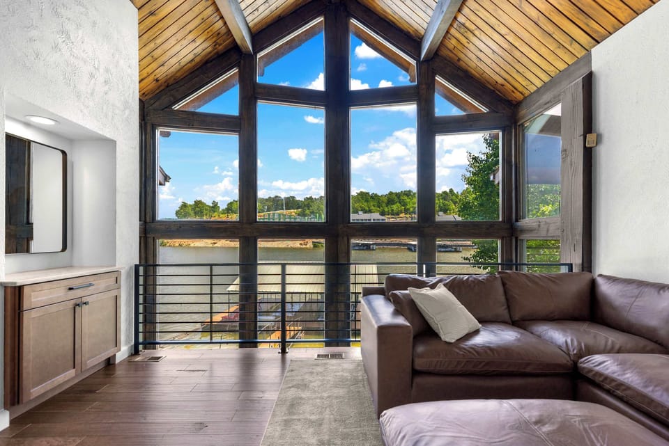 Breathtaking floor-to-ceiling lake views from the comfort of your living room—where relaxation meets the water’s edge.