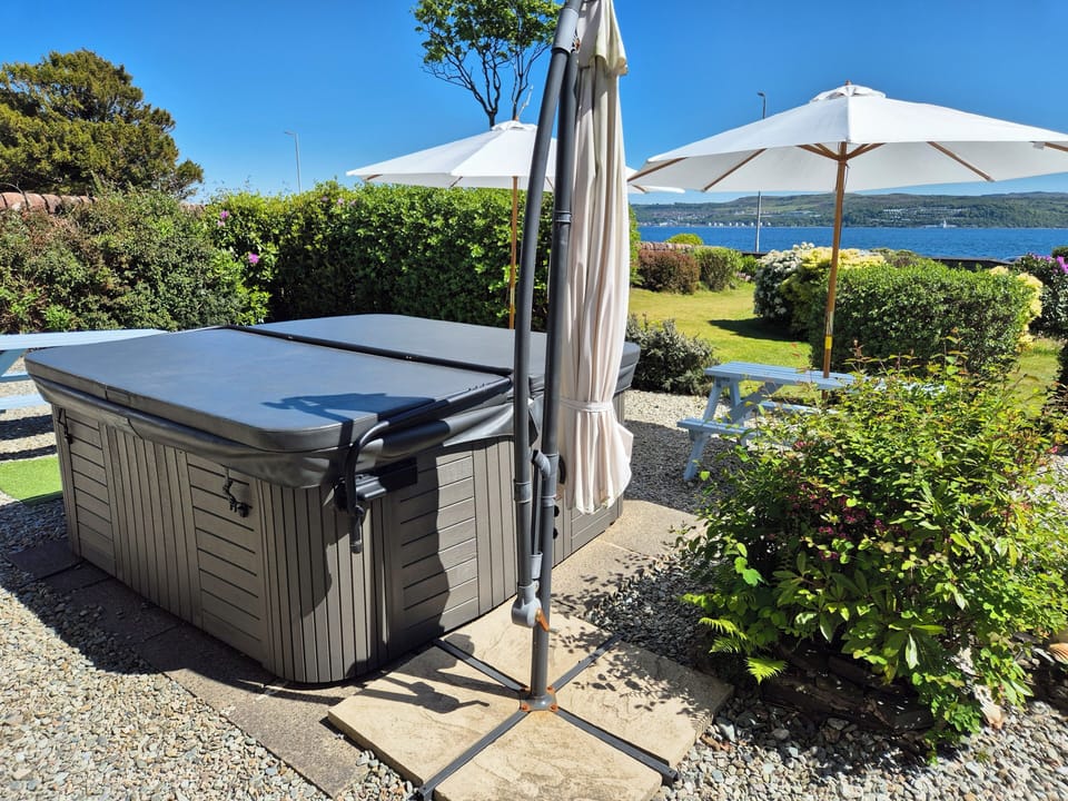 hot tub and outdoor seating 