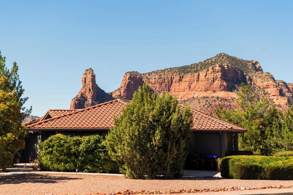 Magical red rocks cradle your desert retreat
